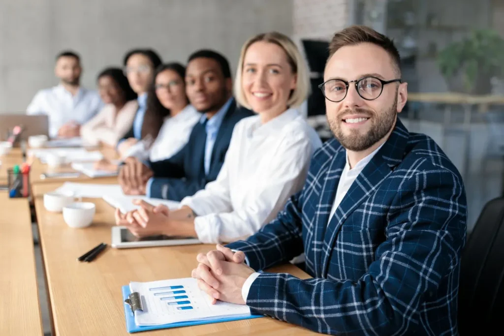 successful businessman and his colleagues sitting 2025 03 18 15 57 27 utc1
